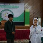 a man and a woman on a stage